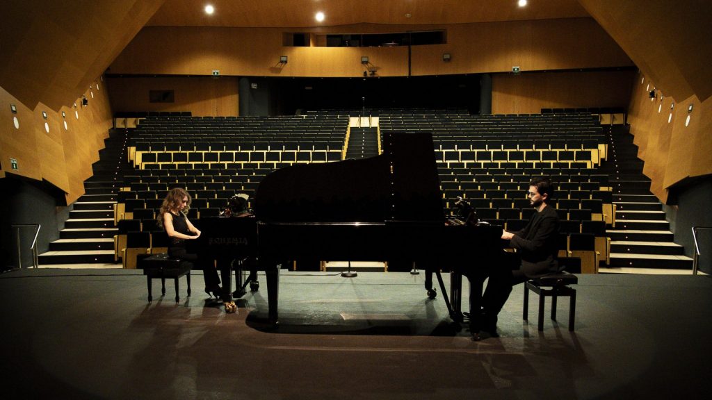 Ikigai Duo rehearsing at a theatre. View from stage