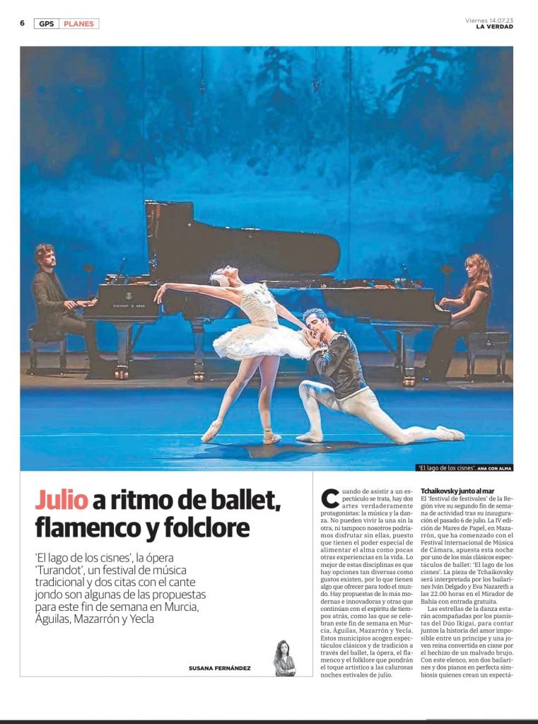 Ikigai Duo in the newspaper talking about their performance of Swan Lake with dancers